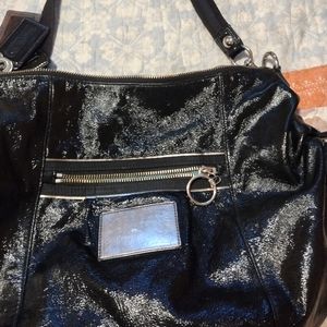 Black patent Coach handbag